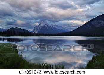 Stock Photo - evening clouds 
on vermilion lakes 
with mount rundle. 
fotosearch - search 
stock photos, 
pictures, images, 
and photo clipart