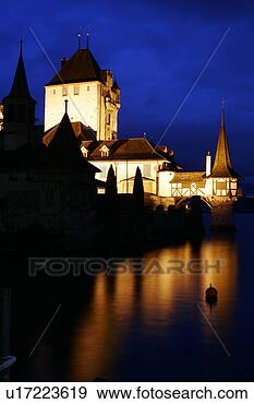 Stock Photograph - oberhofen castle 
at night with 
reflection on 
lake. fotosearch 
- search stock 
photos, pictures, 
images, and photo 
clipart