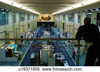 Stock Image - man on balcony 
overlooking convention 
displays. fotosearch 
- search stock 
photos, pictures, 
images, and photo 
clipart
