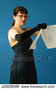 Stock Photograph - woman in black 
tears paper. fotosearch 
- search stock 
photos, pictures, 
images, and photo 
clipart