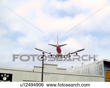 Stock Photo - aircraft coming 
in to land. fotosearch 
- search stock 
photos, pictures, 
images, and photo 
clipart