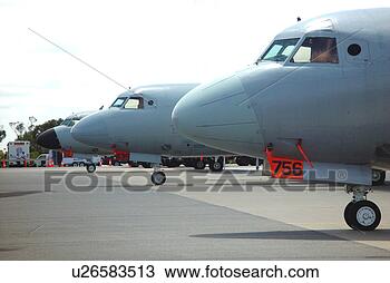 Stock Photo - aircraft lined 
up on runway. 
fotosearch - search 
stock photos, 
pictures, images, 
and photo clipart