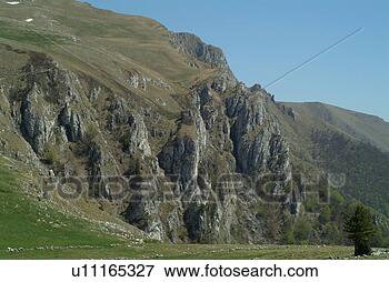 Picture - rockface on the 
vlasic mountain, 
bosnia, herzegovina. 
fotosearch - search 
stock photos, 
pictures, images, 
and photo clipart