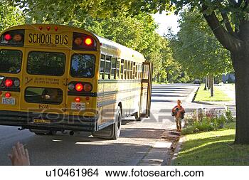 Stock Photo - boy waiting at 
curb for mom to 
pick him up after 
school bus ride. 
fotosearch - search 
stock photos, 
pictures, images, 
and photo clipart