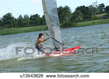 Stock Photo - windsurfer in 
action. fotosearch 
- search stock 
photos, pictures, 
images, and photo 
clipart