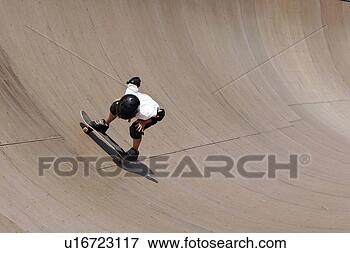 Picture - skateboarder on 
a huge half pipe. 
fotosearch - search 
stock photos, 
pictures, images, 
and photo clipart