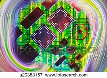 Picture - assortment of 
integrated circuits 
against printed 
circuit board. 
fotosearch - search 
stock photos, 
pictures, images, 
and photo clipart