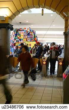 Stock Photo - a busy train station 
people rush to 
catch their public 
transport. fotosearch 
- search stock 
photos, pictures, 
images, and photo 
clipart