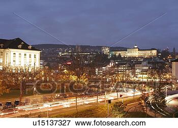 Picture - night scene of 
city center with 
busy street - 
zurich switzerland. 
fotosearch - search 
stock photos, 
pictures, images, 
and photo clipart
