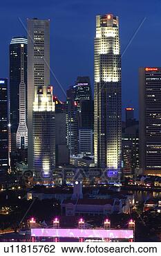 Stock Photo - central business 
district, city 
skyline at night, 
singapore. fotosearch 
- search stock 
photos, pictures, 
images, and photo 
clipart