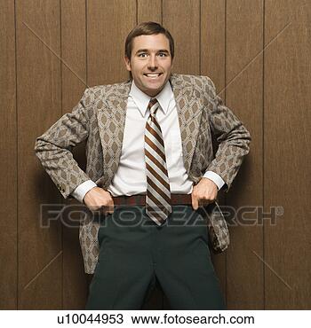 Stock Photo - mid-adult smiling 
 caucasian male 
in retro suit 
pulling up on 
pants. fotosearch 
- search stock 
photos, pictures, 
images, and photo 
clipart