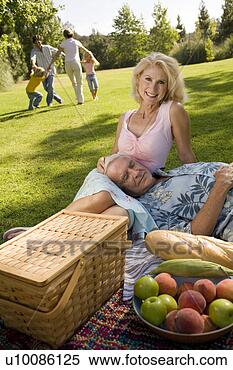 Stock Image - grandparents and 
family in park. 
fotosearch - search 
stock photos, 
pictures, images, 
and photo clipart