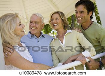 Stock Photo - two generations 
in park. fotosearch 
- search stock 
photos, pictures, 
images, and photo 
clipart