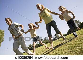 Stock Photo - family in park. 
fotosearch - search 
stock photos, 
pictures, images, 
and photo clipart