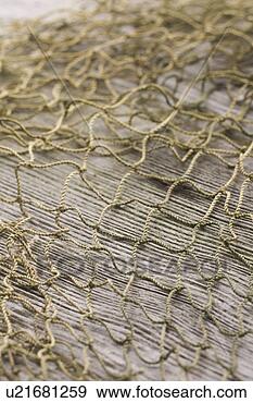 Stock Photograph - brown, close-up, 
fishing net, net. 
fotosearch - search 
stock photos, 
pictures, images, 
and photo clipart
