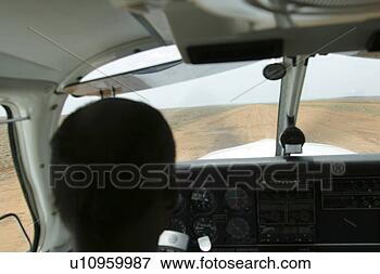 Foto - voando,  ao ar 
livre,  avião. 
fotosearch - busca 
de fotos, imagens 
e clipart