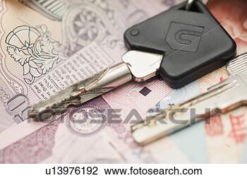 Stock Photo - high angle view 
of car keys on 
indian banknotes. 
fotosearch - search 
stock photos, 
pictures, images, 
and photo clipart