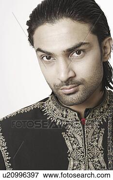 Picture - portrait of a 
young man in traditional 
clothing. fotosearch 
- search stock 
photos, pictures, 
images, and photo 
clipart