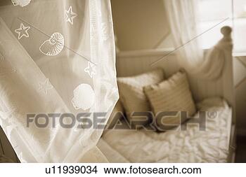 Stock Photo - bed with shell 
patterned drapery. 
fotosearch - search 
stock photos, 
pictures, images, 
and photo clipart