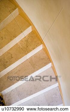 Stock Photography - view from above 
of curved stone 
staircase. fotosearch 
- search stock 
photos, pictures, 
images, and photo 
clipart