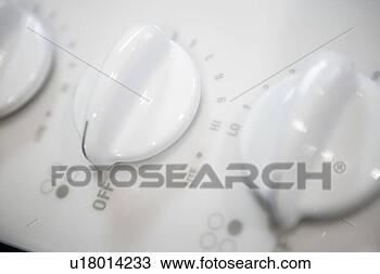 Stock Photo - detail of white 
stove knobs, close 
up. fotosearch 
- search stock 
photos, pictures, 
images, and photo 
clipart