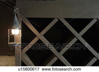 Picture - wine cellar rack 
with lantern. 
fotosearch - search 
stock photos, 
pictures, images, 
and photo clipart