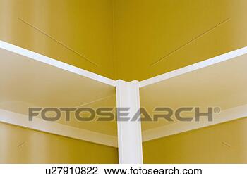 Stock Photo - empty shelves 
in yellow closet. 
fotosearch - search 
stock photos, 
pictures, images, 
and photo clipart