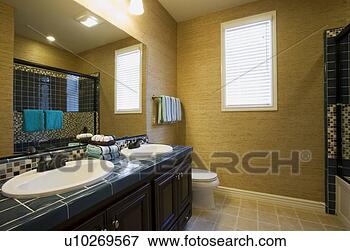 Picture - bathroom with 
two sinks and 
tile floor. fotosearch 
- search stock 
photos, pictures, 
images, and photo 
clipart
