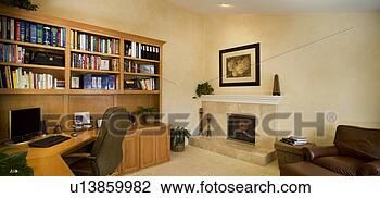 Stock Photo - traditional home 
office with built 
in wood shelving, 
 fireplace,  and. 
fotosearch - search 
stock photos, 
pictures, images, 
and photo clipart