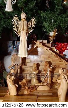 Stock Photo - creche nativity 
scene under the 
christmas tree. 
fotosearch - search 
stock photos, 
pictures, images, 
and photo clipart