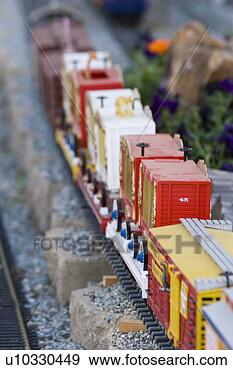 Stock Photograph - model train on 
its track. fotosearch 
- search stock 
photos, pictures, 
images, and photo 
clipart