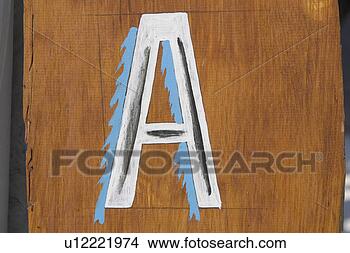 Stock Photo - brown, close-up, 
capital letter, 
alphabet. fotosearch 
- search stock 
photos, pictures, 
images, and photo 
clipart