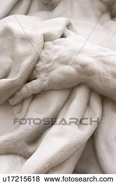 Stock Photo - statuette, sculpture, 
statue, polished, 
stone, artifact. 
fotosearch - search 
stock photos, 
pictures, images, 
and photo clipart