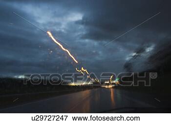 Picture - close-up, clouds, 
dark, flash, glow. 
fotosearch - search 
stock photos, 
pictures, images, 
and photo clipart
