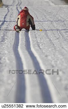 Stock Photo - day, kneeling, 
knit hat, non-urban 
scene. fotosearch 
- search stock 
photos, pictures, 
images, and photo 
clipart