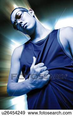 Stock Photograph - young adult man 
posing, photography, 
cg, composite, 
low angle view. 
fotosearch - search 
stock photos, 
pictures, images, 
and photo clipart