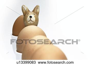 Stock Photo - background, bowl, 
brown, decoration, 
ears, easter, 
easter bunny. 
fotosearch - search 
stock photos, 
pictures, images, 
and photo clipart