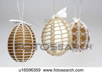 Stock Photograph - brown, around-ticks, 
bowl, beige, background, 
decoration, amount. 
fotosearch - search 
stock photos, 
pictures, images, 
and photo clipart