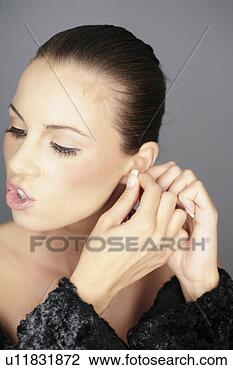 Stock Photo - checkers, studio, 
vogue, earring, 
beauty, attach, 
control. fotosearch 
- search stock 
photos, pictures, 
images, and photo 
clipart