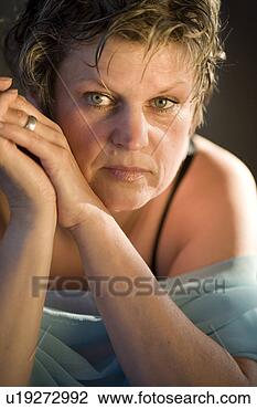 Stock Photo - day, brown, contemplative, 
close-up, brunette, 
adults. fotosearch 
- search stock 
photos, pictures, 
images, and photo 
clipart