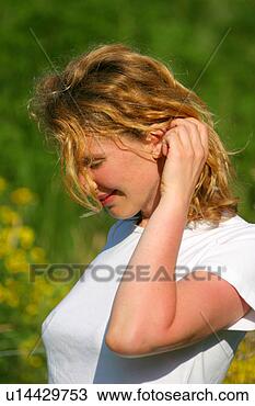 Stock Photo - verlegen, adults, 
bashful, blond. 
fotosearch - search 
stock photos, 
pictures, images, 
and photo clipart