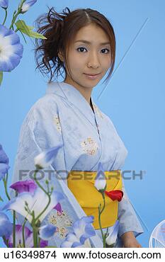 Stock Photo - portrait of a 
teenage girl in 
traditional outfit. 
fotosearch - search 
stock photos, 
pictures, images, 
and photo clipart