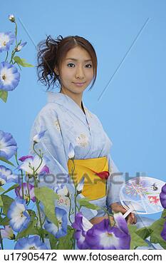 Stock Photo - portrait of a 
teenage girl in 
traditional outfit. 
fotosearch - search 
stock photos, 
pictures, images, 
and photo clipart