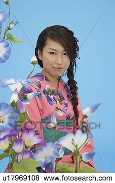 Stock Photo - portrait of a 
teenage girl in 
traditional outfit. 
fotosearch - search 
stock photos, 
pictures, images, 
and photo clipart