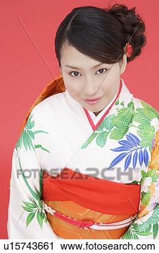 Stock Photography - view of teenage 
girl in traditional 
outfit. fotosearch 
- search stock 
photos, pictures, 
images, and photo 
clipart