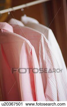 Stock Photography - blouses in closet. 
fotosearch - search 
stock photos, 
pictures, images, 
and photo clipart