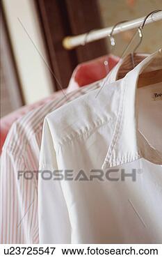 Picture - blouses in closet. 
fotosearch - search 
stock photos, 
pictures, images, 
and photo clipart