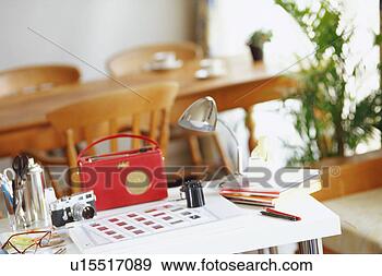 Stock Photograph - camera and slides 
on table. fotosearch 
- search stock 
photos, pictures, 
images, and photo 
clipart