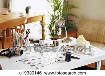 Stock Photo - camera and slides 
on table. fotosearch 
- search stock 
photos, pictures, 
images, and photo 
clipart