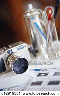 Stock Photography - camera and slides. 
fotosearch - search 
stock photos, 
pictures, images, 
and photo clipart
